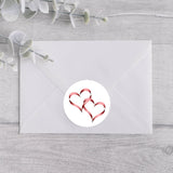 Pink Intertwined Hearts Round Stickers